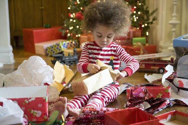 kid opening gifts
