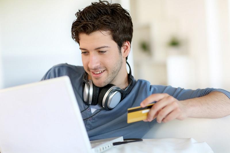 young man with credit card